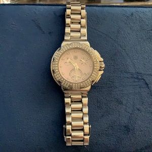 Tag women’s Formula 1. Looks new, diamond bezel with mother of pearl face.